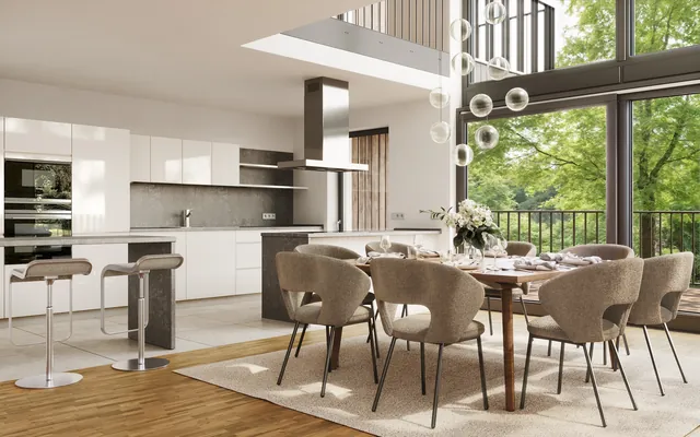 Offene Küche mit Essplatz vor großer Glasfront in einer Wohnung in Wolfsburg